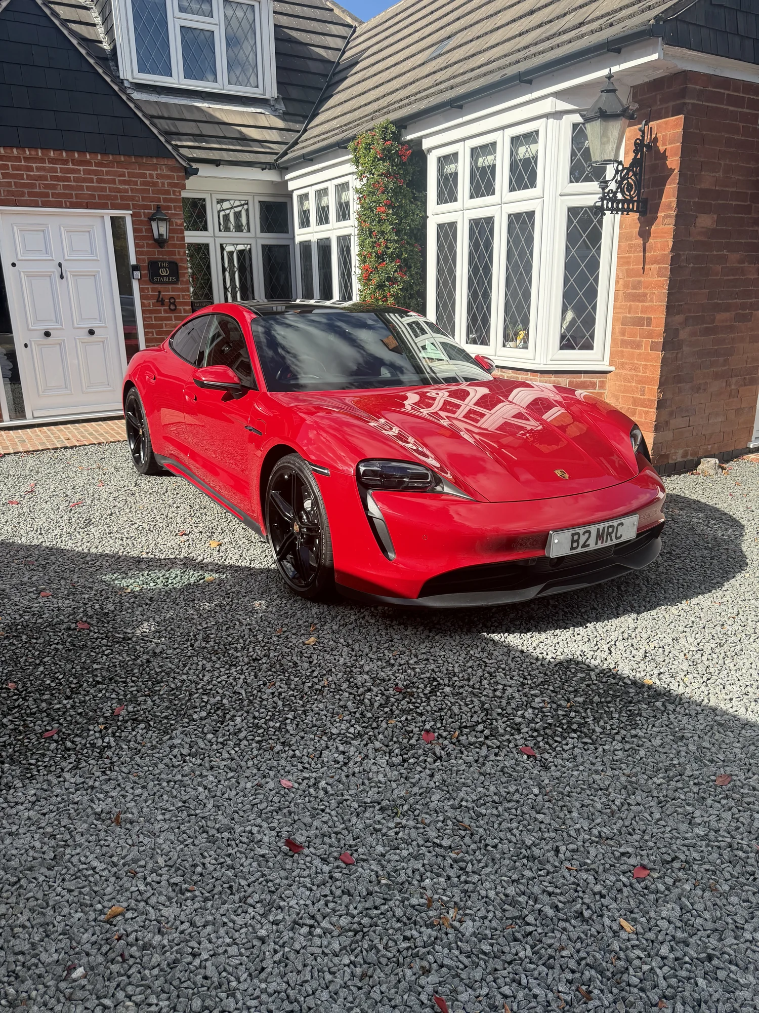 Glossy red Porsche after professional valeting