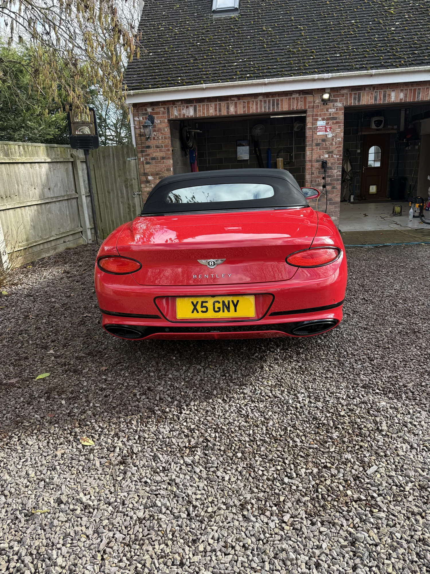 Red Bentley convertible after valeting